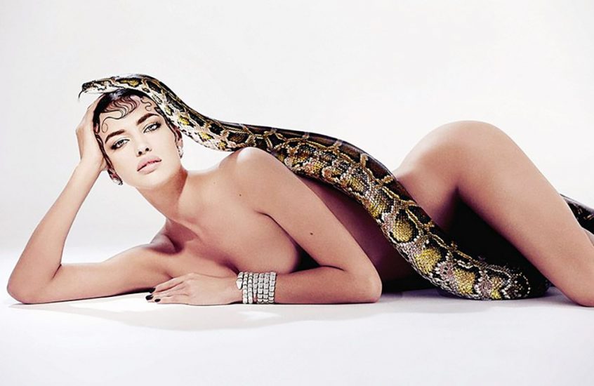 Irina Shayk posing with snake